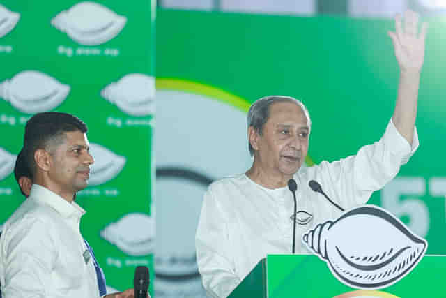 Naveen Patnaik (right) with his blue-eyed boy, V K Pandian